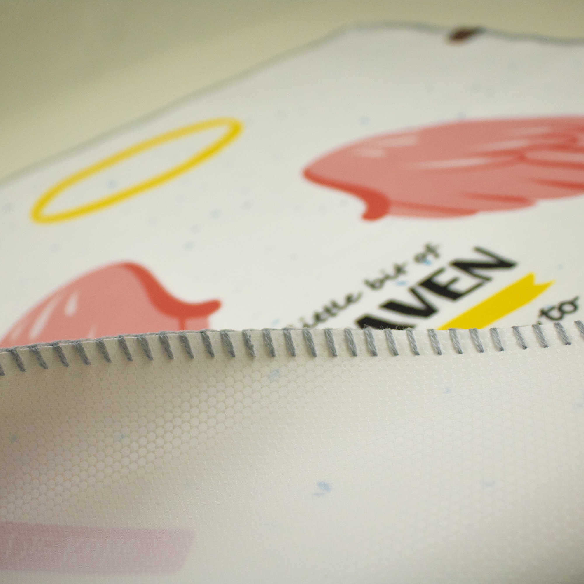 زیرانداز تعویض نوزاد طرح بال فرشته دی‌روحه ضدآب و قابل شستشو