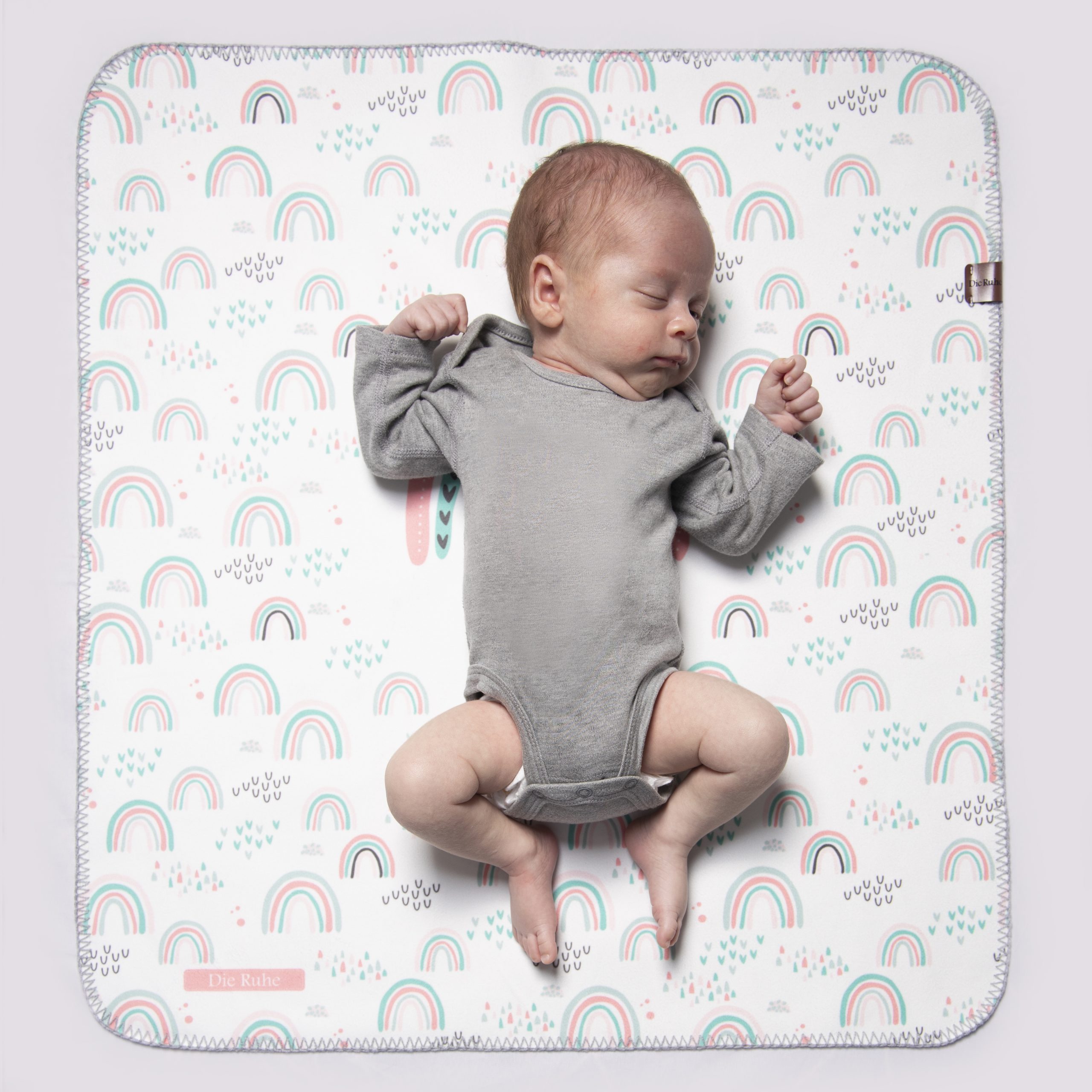 زیرانداز تعویض نوزاد طرح رنگین کمان دی‌روحه ضدآب و قابل شستشو