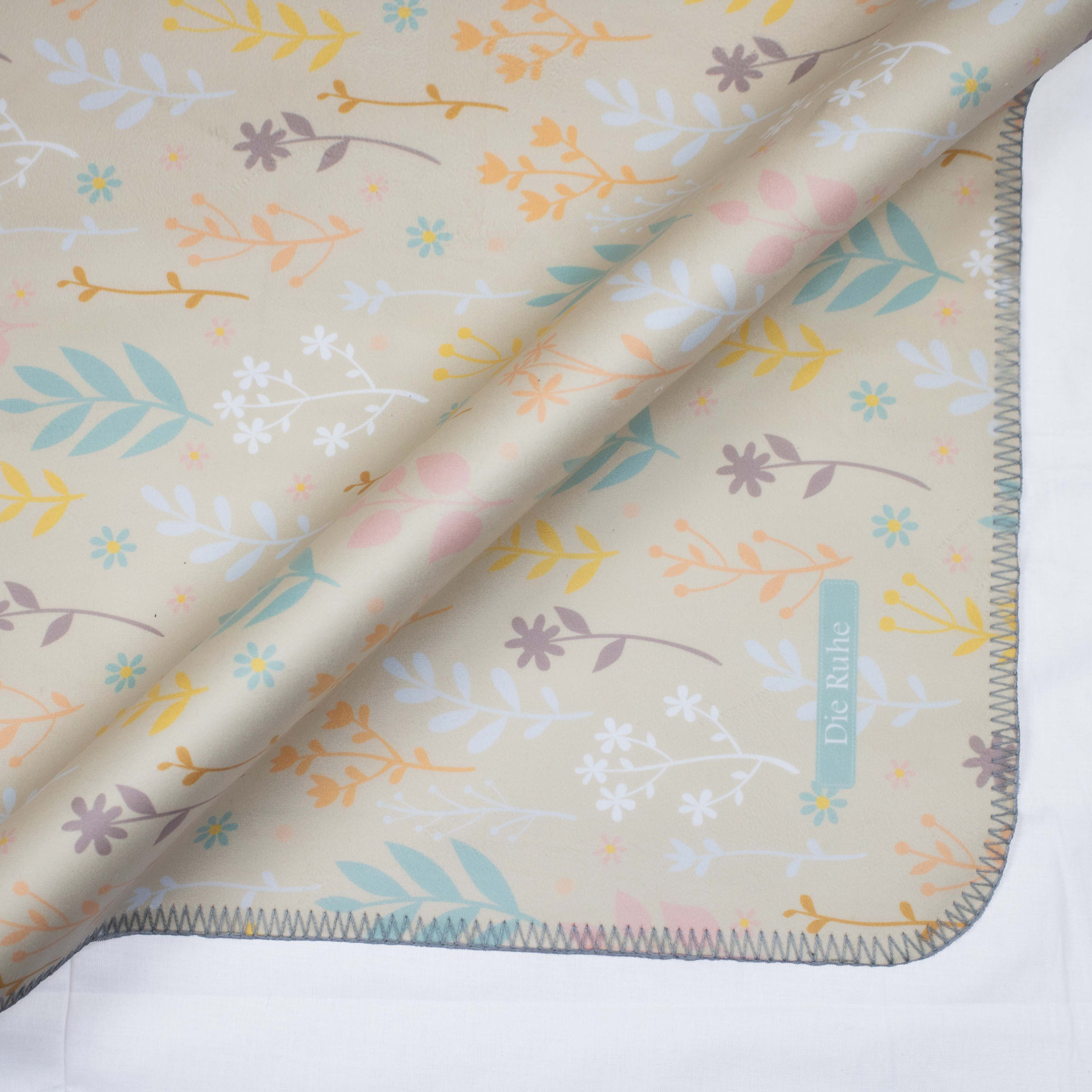 زیرانداز تعویض نوزاد طرح گیاه دی‌روحه ضدآب و قابل شستشو